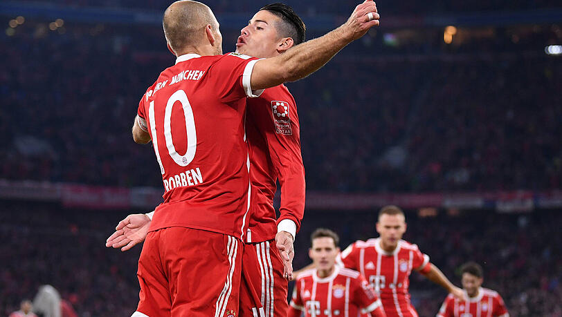 Endlich wieder Spitzenreiter: Die Bayern um Arjen Robben (l.) und James Rodríguez. Endlich wieder Spitzenreiter: Die Bayern um Arjen Robben (l.) und James Rodríguez.