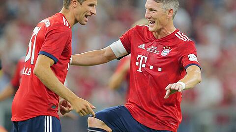 Thomas Müller und Bastian Schweinsteiger kickten einst Seite an Seite für den FC Bayern München. Thomas Müller und Bastian Schweinsteiger kickten einst Seite an Seite für den FC Bayern München.