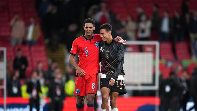 Gute Kumpels und nun im Champions-League-Halbfinale Gegner: Real-Star Jude Bellingham (l.) und Bayerns Jamal Musiala.