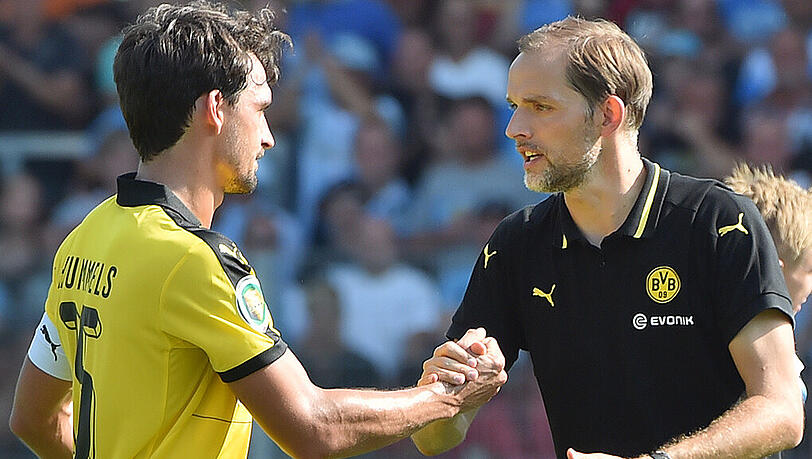BVB-Trainer Thomas Tuchel (rechts) verzichtet in Saloniki unter anderem auf die Dienste seines Kapitäns Mats Hummels (links). BVB-Trainer Thomas Tuchel (rechts) verzichtet in Saloniki unter anderem auf die Dienste seines Kapitäns Mats Hummels (links).