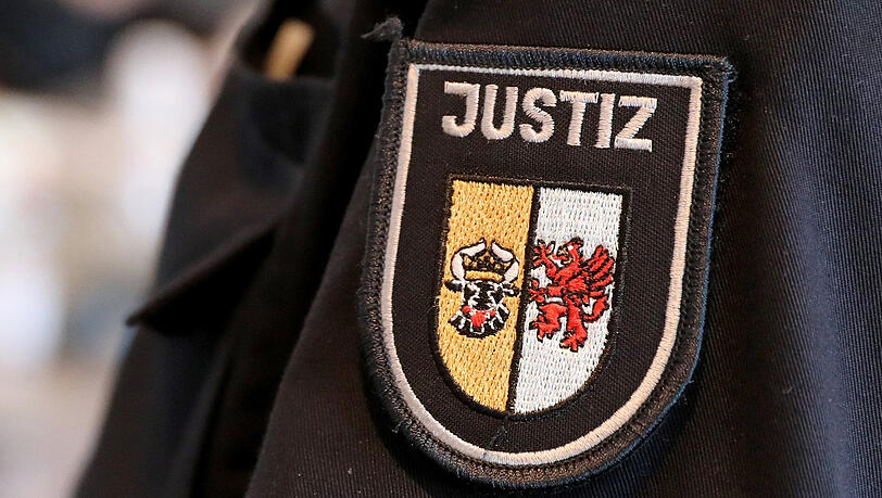 Ärmelabzeichen eines Justizbeamten. Ärmelabzeichen eines Justizbeamten.
