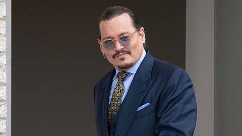 Johnny Depp vor dem Gerichtsgebäude während seines Prozesses im Mai. Johnny Depp vor dem Gerichtsgebäude während seines Prozesses im Mai.