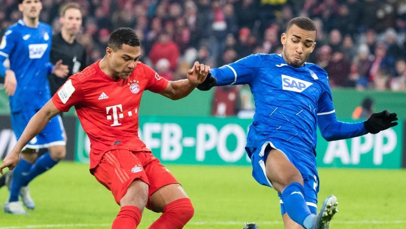David Alaba (l) und Kevin Akpoguma im Zweikampf um den Ball. Foto: Matthias Balk/dpa David Alaba (l) und Kevin Akpoguma im Zweikampf um den Ball. Foto: Matthias Balk/dpa