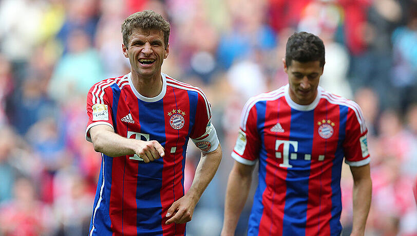 Erzielten alle drei Treffer gegen Frankfurt: Thomas Müller (l.) und Robert Lewandowski (r., 2 Tore). Erzielten alle drei Treffer gegen Frankfurt: Thomas Müller (l.) und Robert Lewandowski (r., 2 Tore).