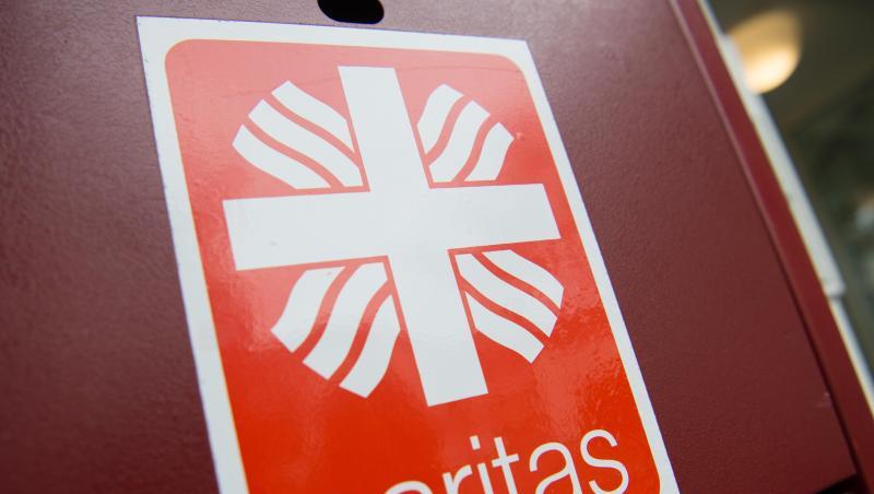 Auf einem Briefkasten im Seniorenzentrum ist das Logo der Caritas zu sehen. Foto: Christophe Gateau/Archivbild Auf einem Briefkasten im Seniorenzentrum ist das Logo der Caritas zu sehen. Foto: Christophe Gateau/Archivbild