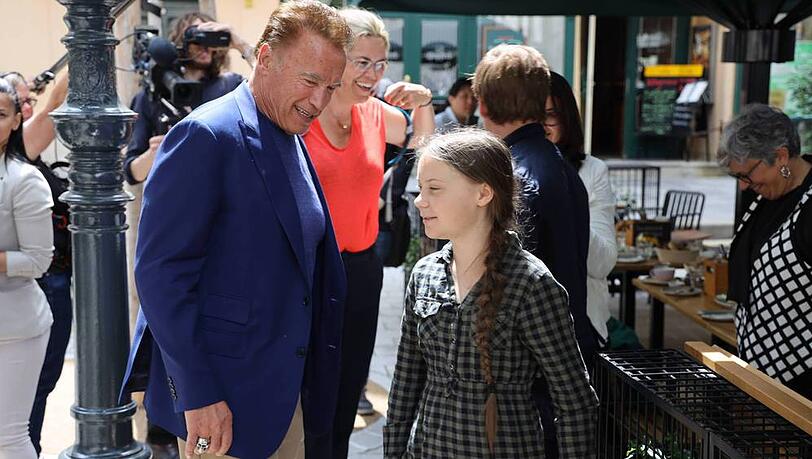 Greta Thunberg (r.) und Arnold Schwarzenegger trafen sich Greta Thunberg (r.) und Arnold Schwarzenegger trafen sich