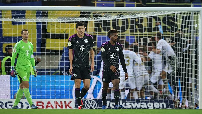 Manuel Neuer, Min-Jae Kim und Kingsley Coman (v.l.) beim Pokal-Aus in Saarbrücken im November 2023. Manuel Neuer, Min-Jae Kim und Kingsley Coman (v.l.) beim Pokal-Aus in Saarbrücken im November 2023.