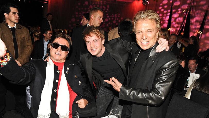 Florian Zimmer mit Siegfried und Roy im Dezember 2012 in München Florian Zimmer mit Siegfried und Roy im Dezember 2012 in München