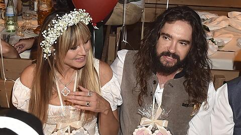 Heidi Klum und Tom Kaulitz feierten 2025 auf dem Oktoberfest. Eine Achterbahn auf der Theresienwiese stach dem Gitarristen besonders ins Auge. Heidi Klum und Tom Kaulitz feierten 2025 auf dem Oktoberfest. Eine Achterbahn auf der Theresienwiese stach dem Gitarristen besonders ins Auge.