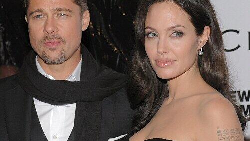 Pitt und Jolie (mit frischen Tattoos) Pitt und Jolie (mit frischen Tattoos)