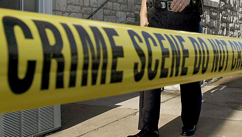 Ein US-Polizist sichert einen Tatort. Foto: Larry W. Smith/Archiv/Illustration Ein US-Polizist sichert einen Tatort. Foto: Larry W. Smith/Archiv/Illustration