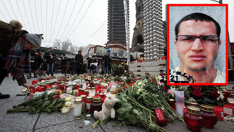 Die Wunde im Herzen der Hauptstadt: Am Anschlagsort vor der Gedächtniskirche in Berlin haben Trauernde Blumen angelegt und Kerzen aufgestellt. Anis Mari (kleines Bild) soll den Anschlag verübt haben. Die Wunde im Herzen der Hauptstadt: Am Anschlagsort vor der Gedächtniskirche in Berlin haben Trauernde Blumen angelegt und Kerzen aufgestellt. Anis Mari (kleines Bild) soll den Anschlag verübt haben.